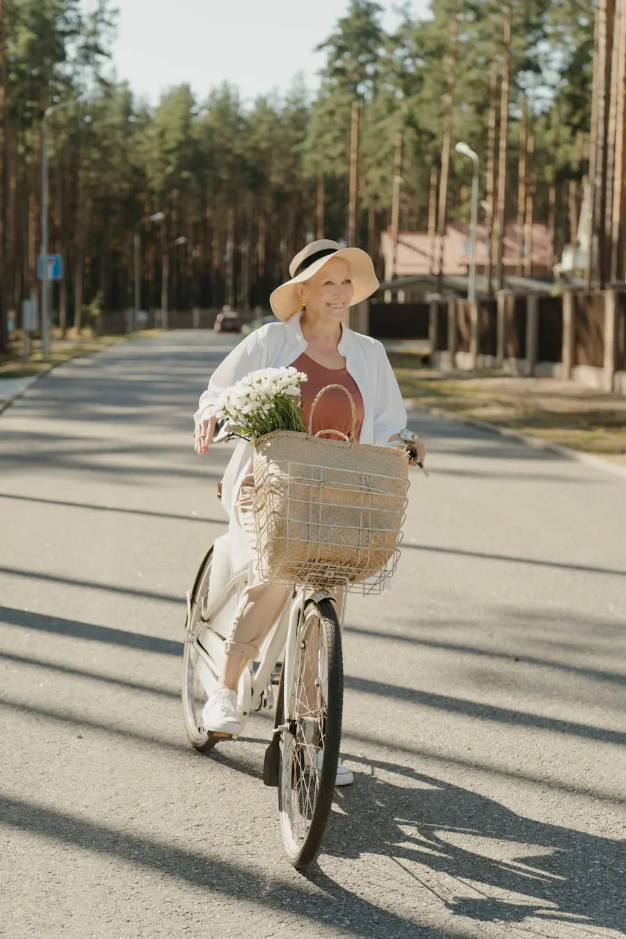 Older lady on a bike with a basket
